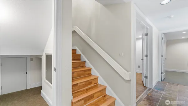 a view of staircase with white walls and white walls