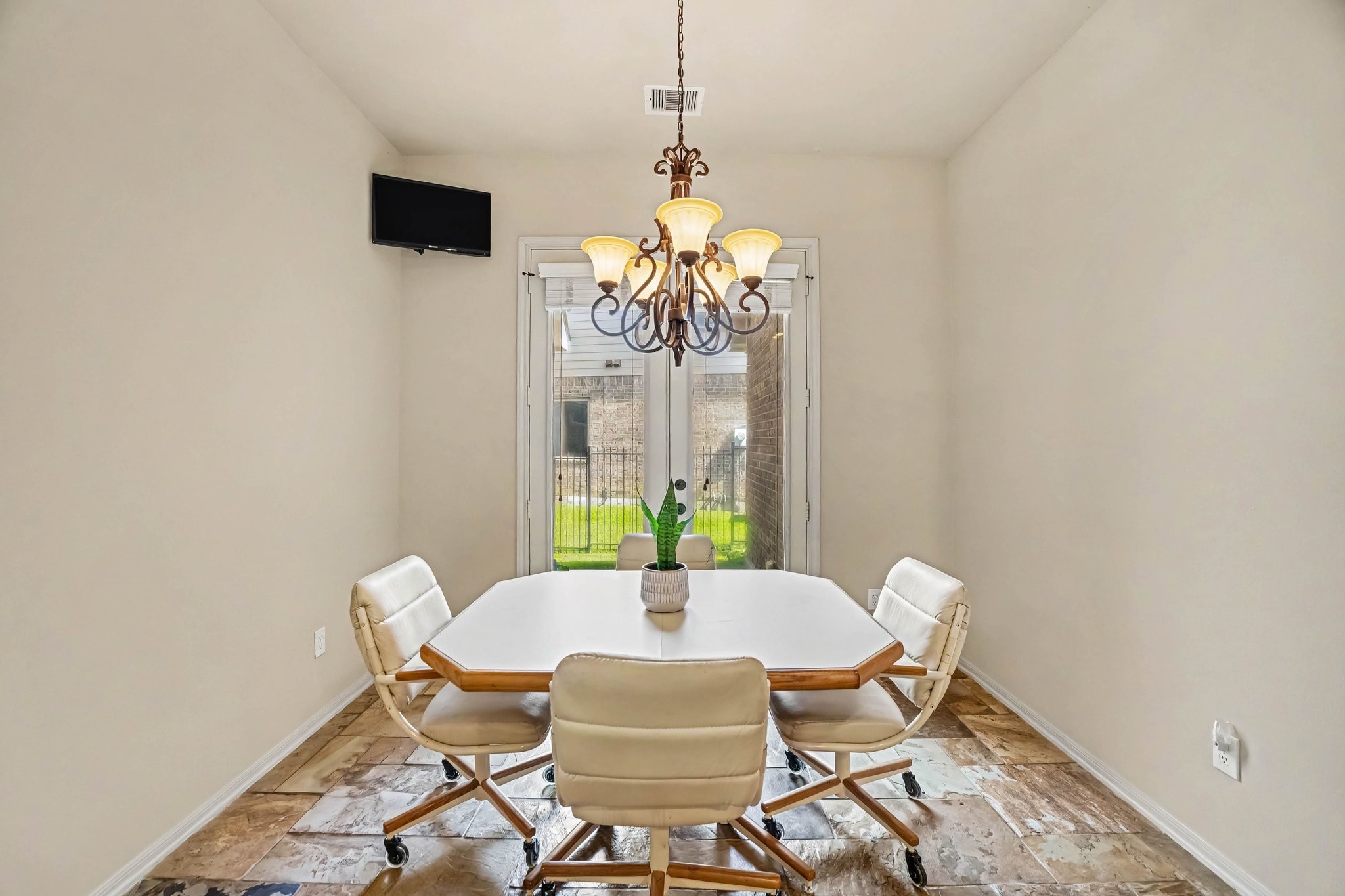 62 Sandwell Place Spring, TX 77389 - Photo 17 of 50 Breakfast area with side yard plumbed with gas for outdoor cooking.