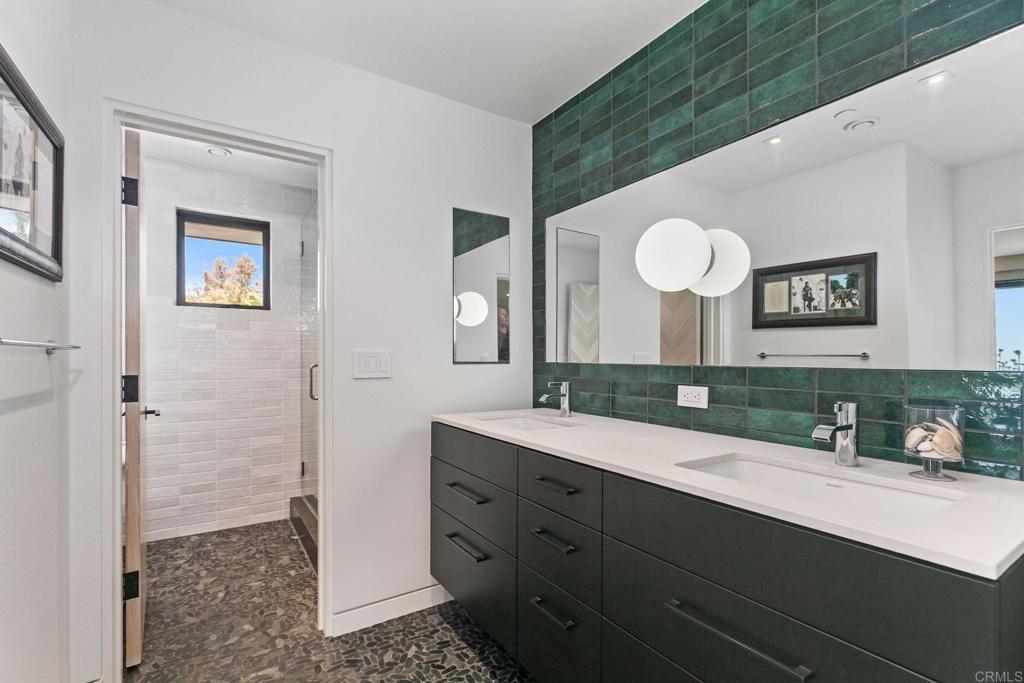 2045 Lowry Place La Jolla, CA 92037 - Photo 14 of 19 a bathroom with a double vanity sink mirror and toilet
