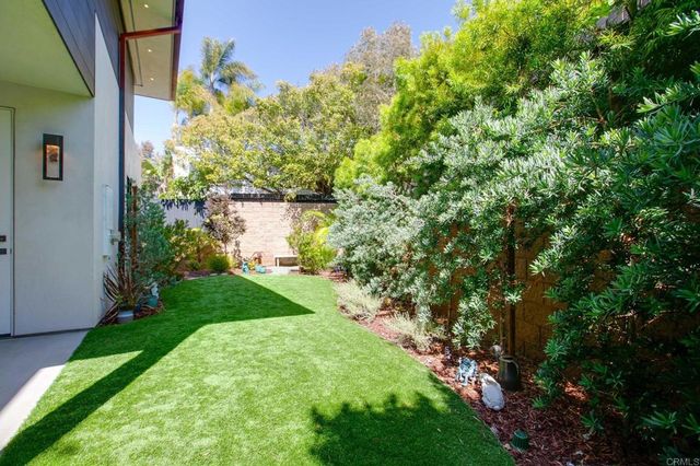 a outdoor living space with furniture and a garden