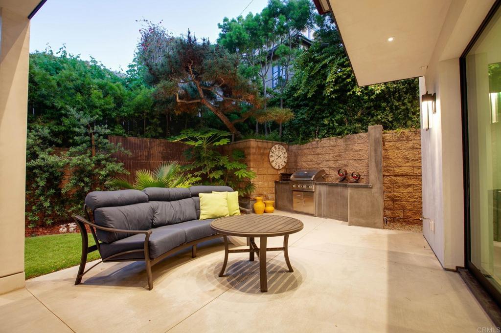 2045 Lowry Place La Jolla, CA 92037 - Photo 16 of 19 a outdoor living space with furniture and a garden