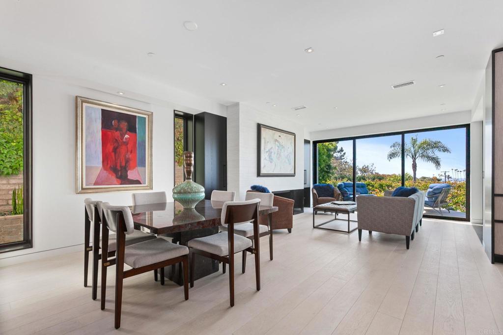 2045 Lowry Place La Jolla, CA 92037 - Photo 7 of 19 a dining room with furniture and wooden floor