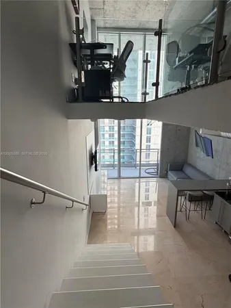 a bathroom with a sink and a large mirror