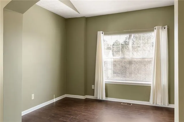 a view of a room that has a window in it