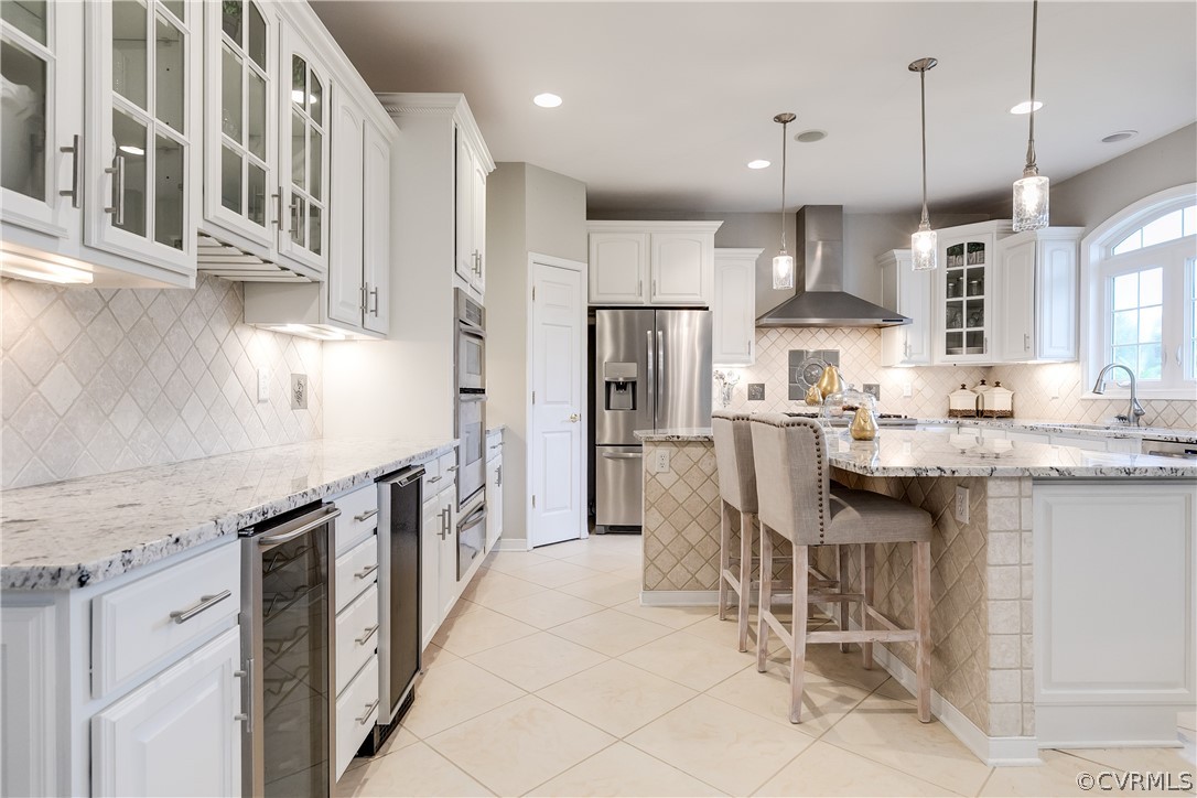 9110 Beaver Bridge Road Moseley, VA 23120 - Photo 11 of 47 Another view of the kitchen that has a wine fridge