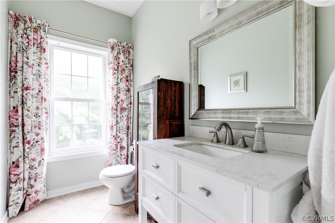 9110 Beaver Bridge Road Moseley, VA 23120 - Photo 20 of 47 Charming first floor powder room with tile floorin