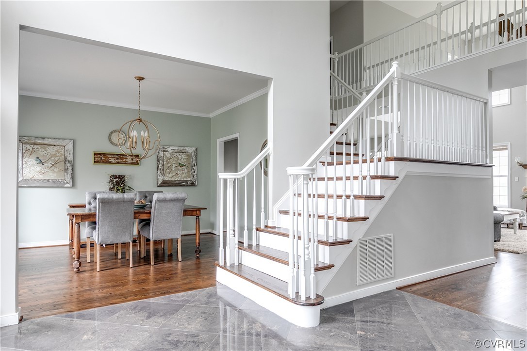 9110 Beaver Bridge Road Moseley, VA 23120 - Photo 3 of 47 The foyer greets you with gorgeous marble tile, fr