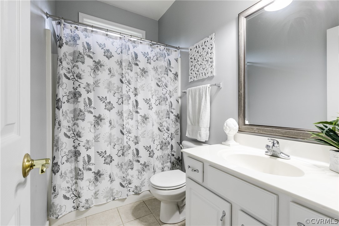 9110 Beaver Bridge Road Moseley, VA 23120 - Photo 31 of 47 Yet another full bath with tile flooring and a tub