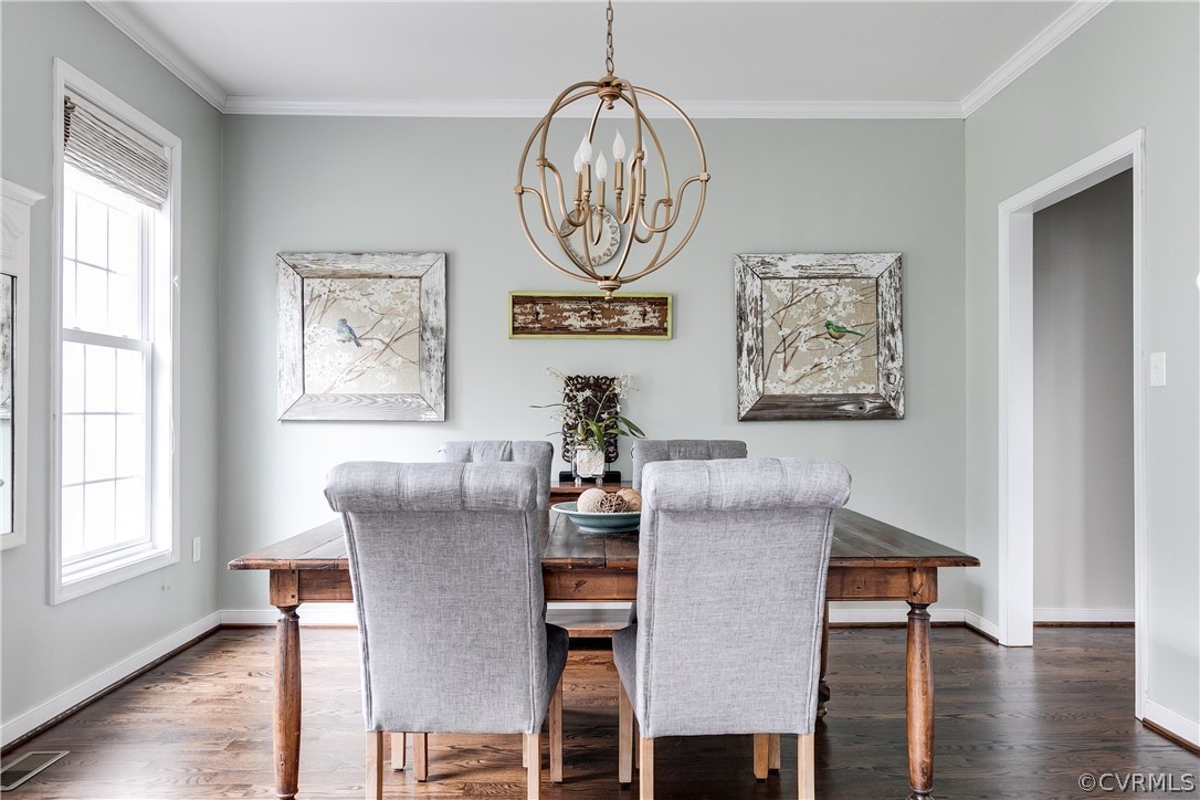 9110 Beaver Bridge Road Moseley, VA 23120 - Photo 4 of 47 The formal dining room has refinished hardwood flo