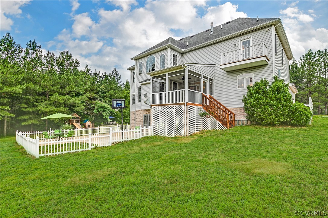 9110 Beaver Bridge Road Moseley, VA 23120 - Photo 45 of 47 Another view of the rear exterior, with steps to t