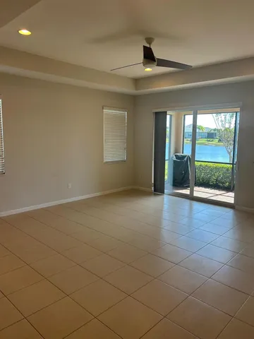 a large kitchen with a large counter top cabinets and stainless steel appliances
