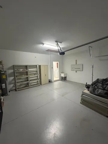 a view of a refrigerator in kitchen