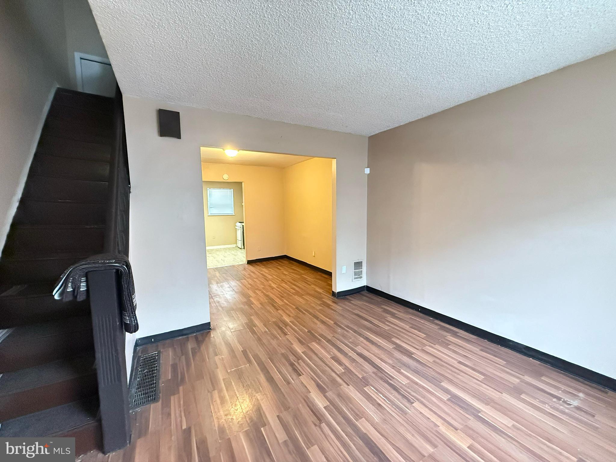 2219 Winton Street Philadelphia, PA 19145 - Photo 2 of 8 a view of empty room with wooden floor