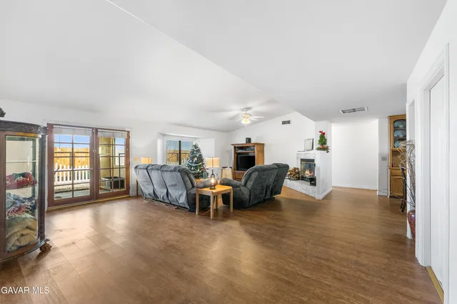 a view of livingroom with furniture and window