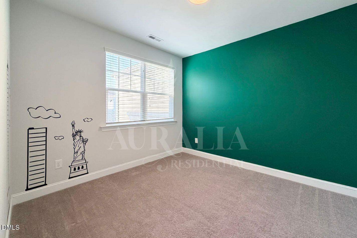 1306 Farm Pond Trail Durham, NC 27703 - Photo 18 of 46 an empty room with windows