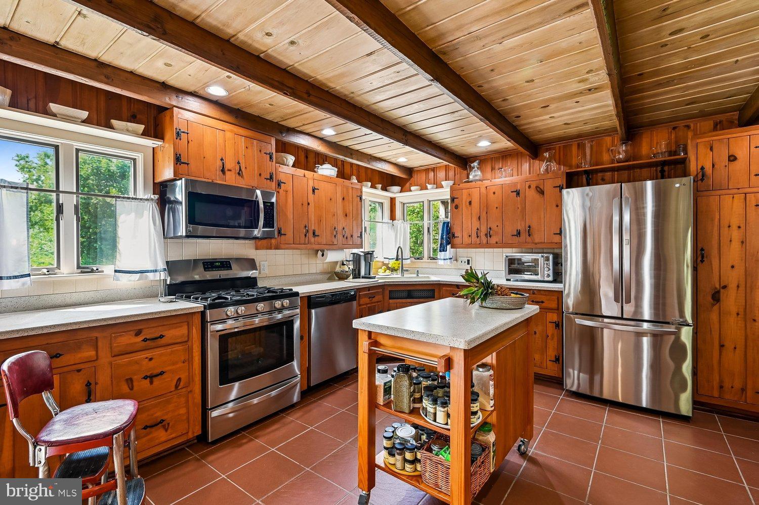 18 Watergate Court Silver Spring, MD 20905 - Photo 11 of 82 Rustic kitchen with warm wooden accents.
