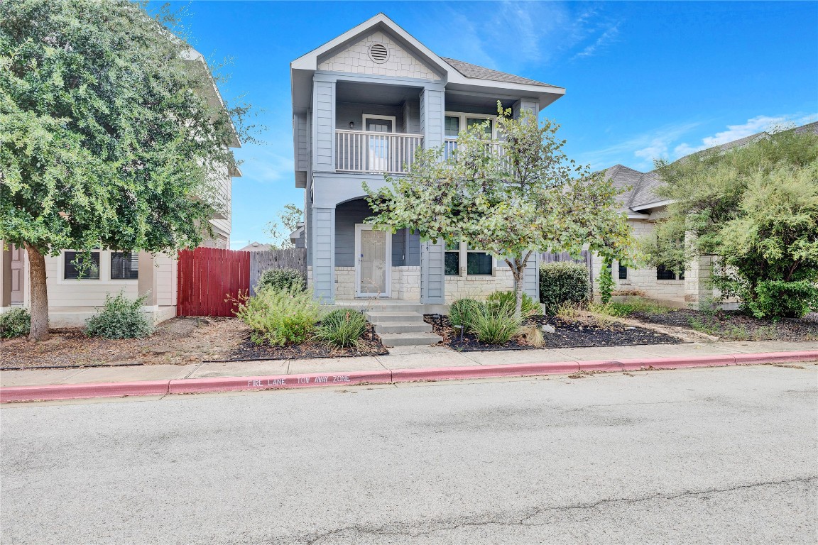 front view of a house with a street
