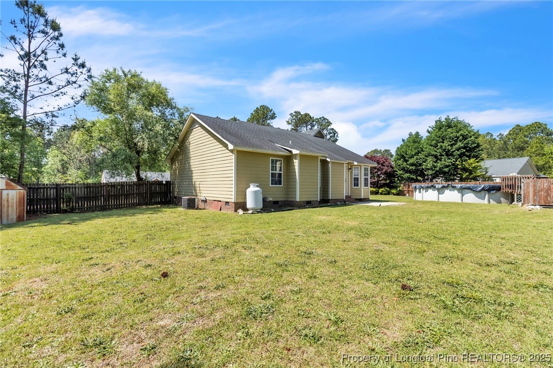 45 Ridgecrest Road Cameron, NC 28326 - Photo 28 of 32 a view of a house with backyard and garden
