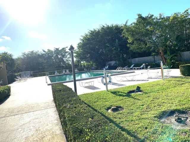 a view of a garden with a bench