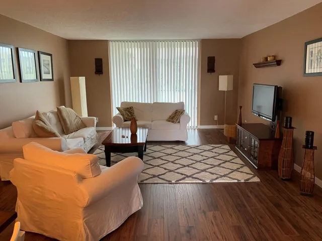 a living room with furniture and a couch
