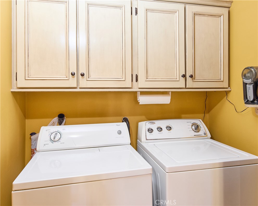 615 Bungalow Drive El Segundo, CA 90245 - Photo 21 of 28 a utility room with dryer and washer