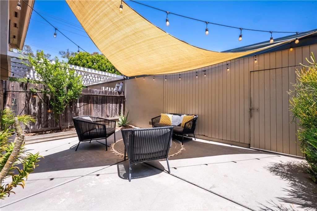 4237 Larwin Avenue Cypress, CA 90630 - Photo 35 of 48 a backyard of a house with table and chairs