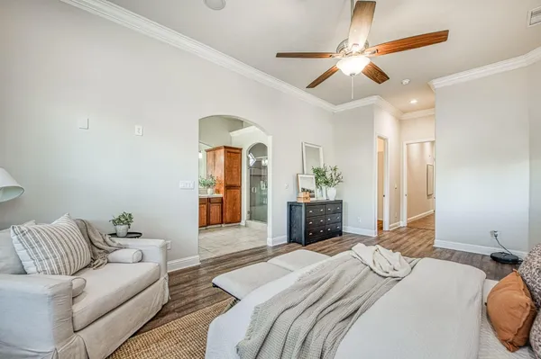 an aerial view of residential houses with outdoor space and ocean view