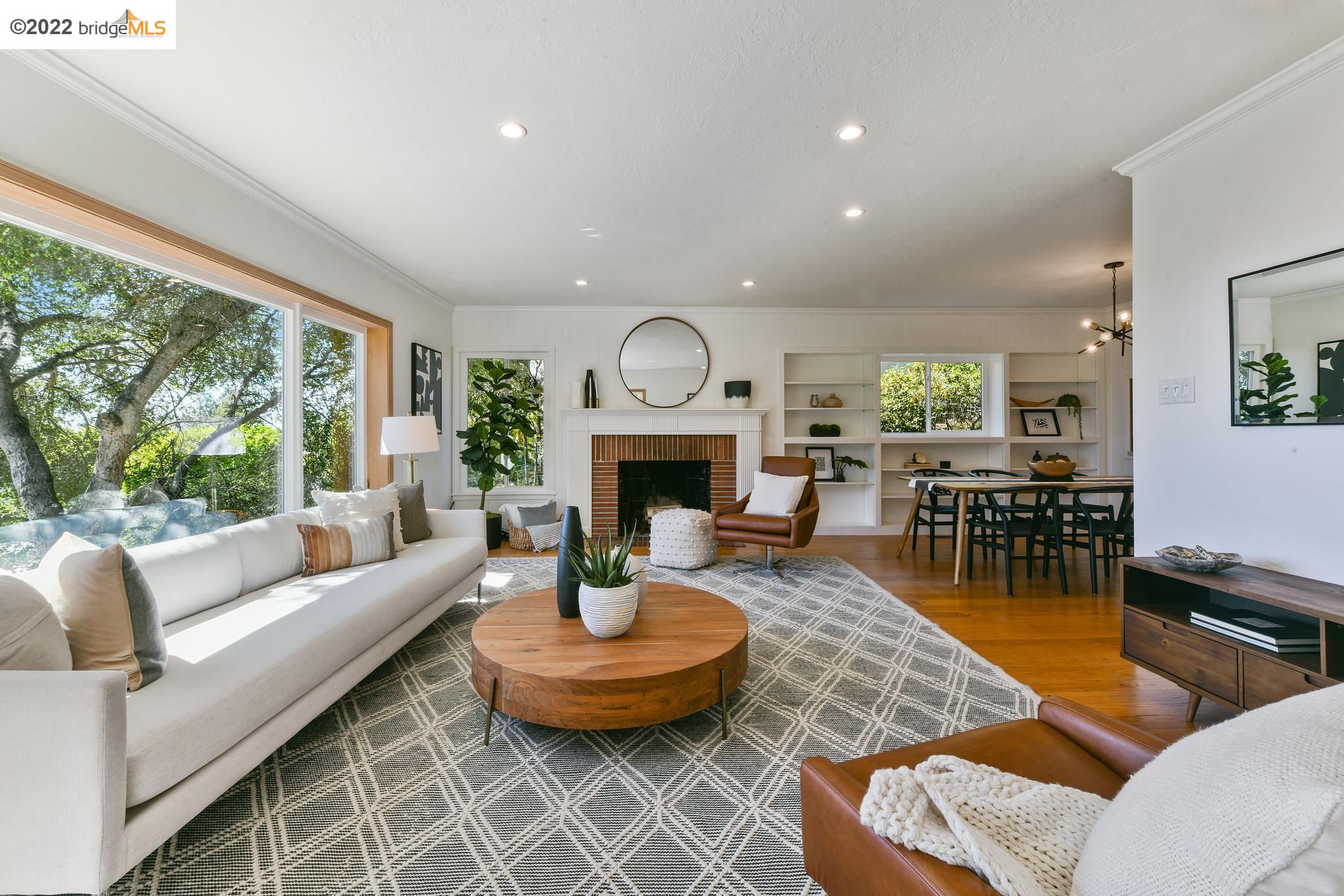 154 Avenida Drive Berkeley, CA 94708 - Photo 1 of 1 a living room with fireplace furniture and a fireplace