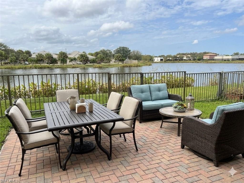 a view of a patio with furniture