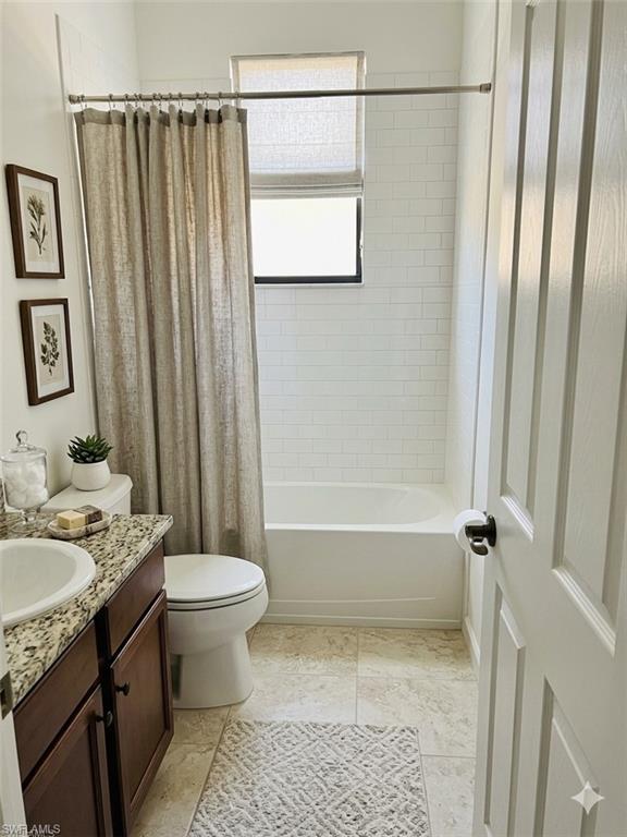 5293 Beckton Road Ave Maria, FL 34142 - Photo 6 of 17 a bathroom with a granite countertop sink toilet and shower