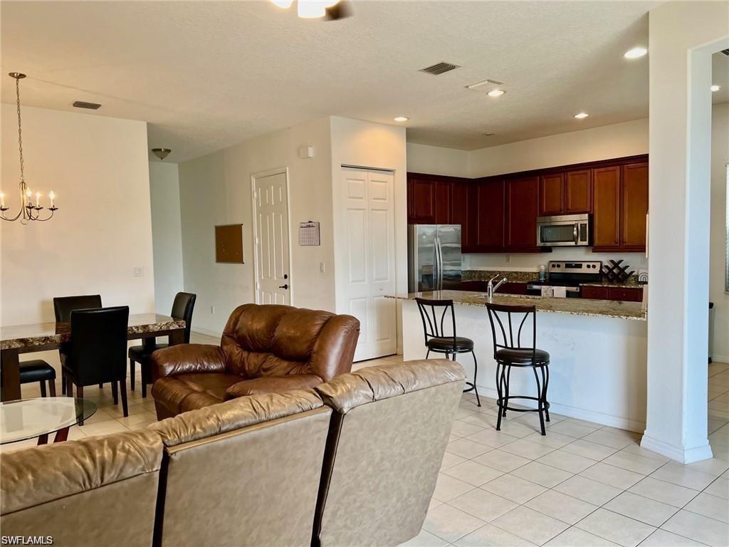 5293 Beckton Road Ave Maria, FL 34142 - Photo 10 of 17 a work place with furniture and a window