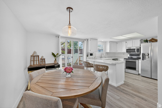 788 East Gables Street Midvale, UT 84047 - Photo 5 of 24 Open-concept kitchen and dining area