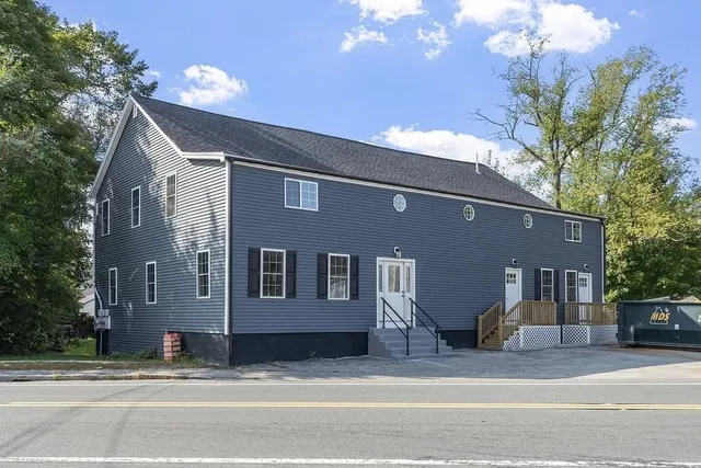 a view of a house with a patio