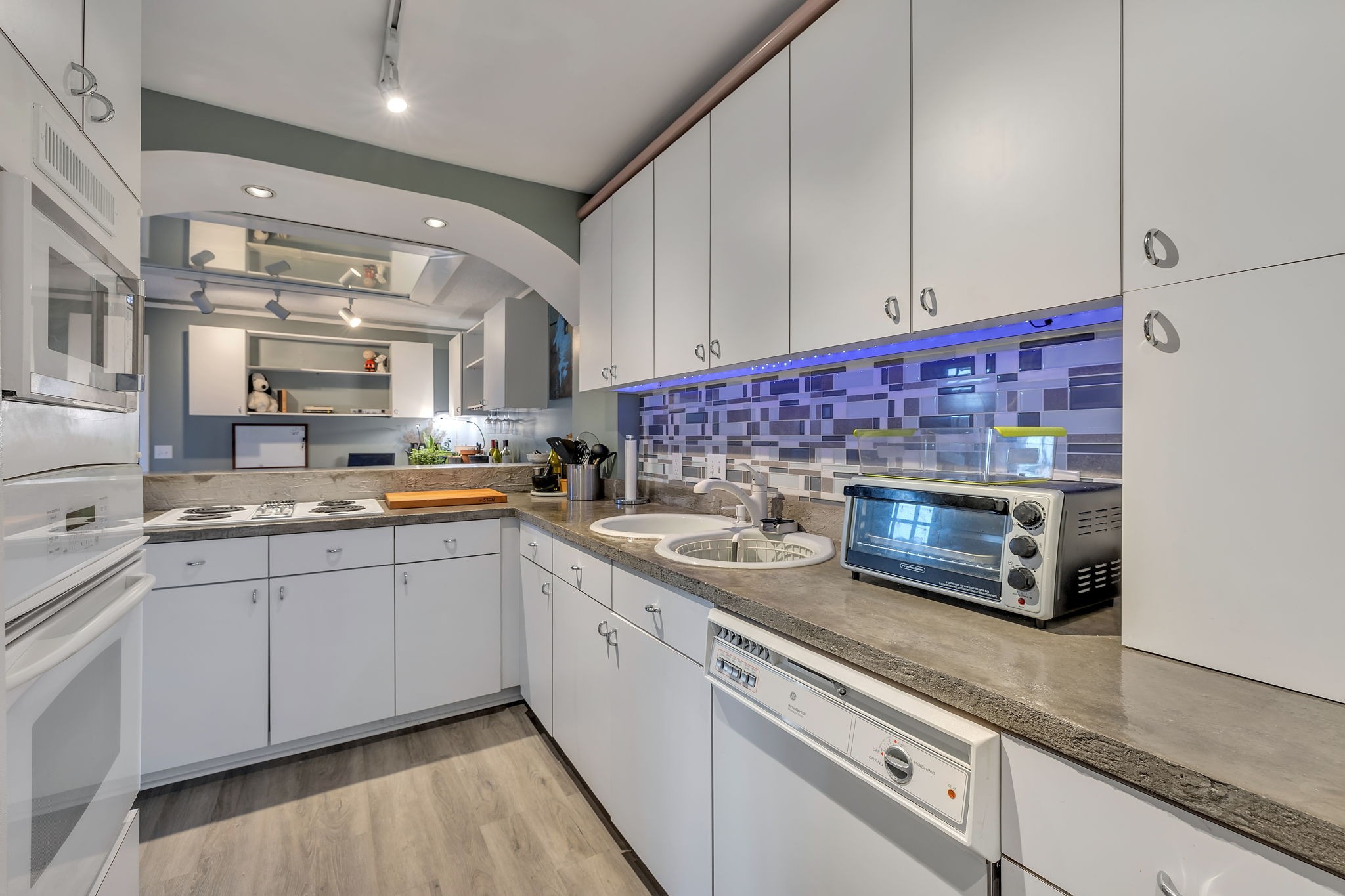214 Harpers Mill Road Hermitage, TN 37076 - Photo 23 of 42 a kitchen with stainless steel appliances granite countertop a sink and a stove