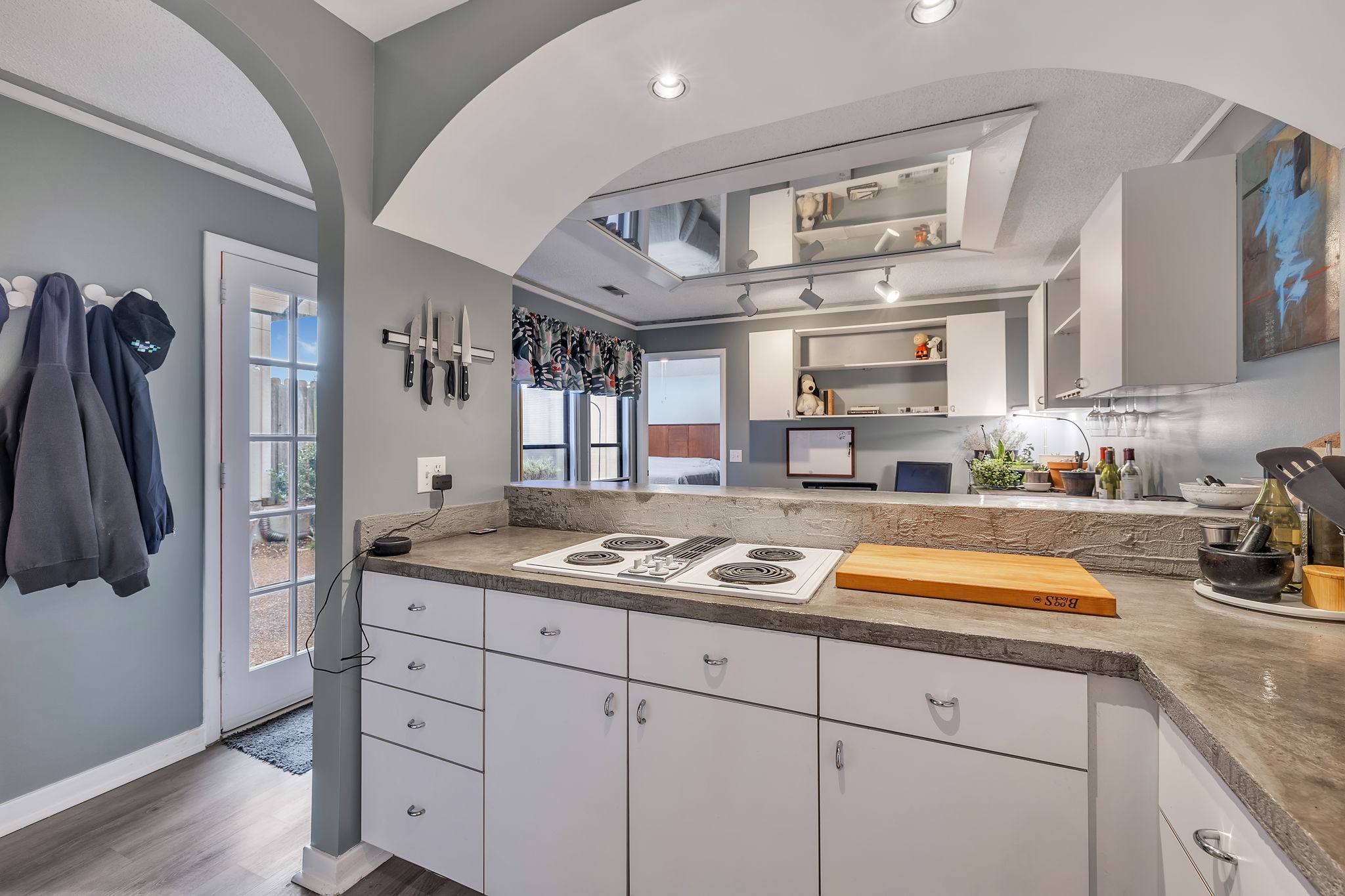214 Harpers Mill Road Hermitage, TN 37076 - Photo 25 of 42 a kitchen with stainless steel appliances granite countertop a sink and cabinets