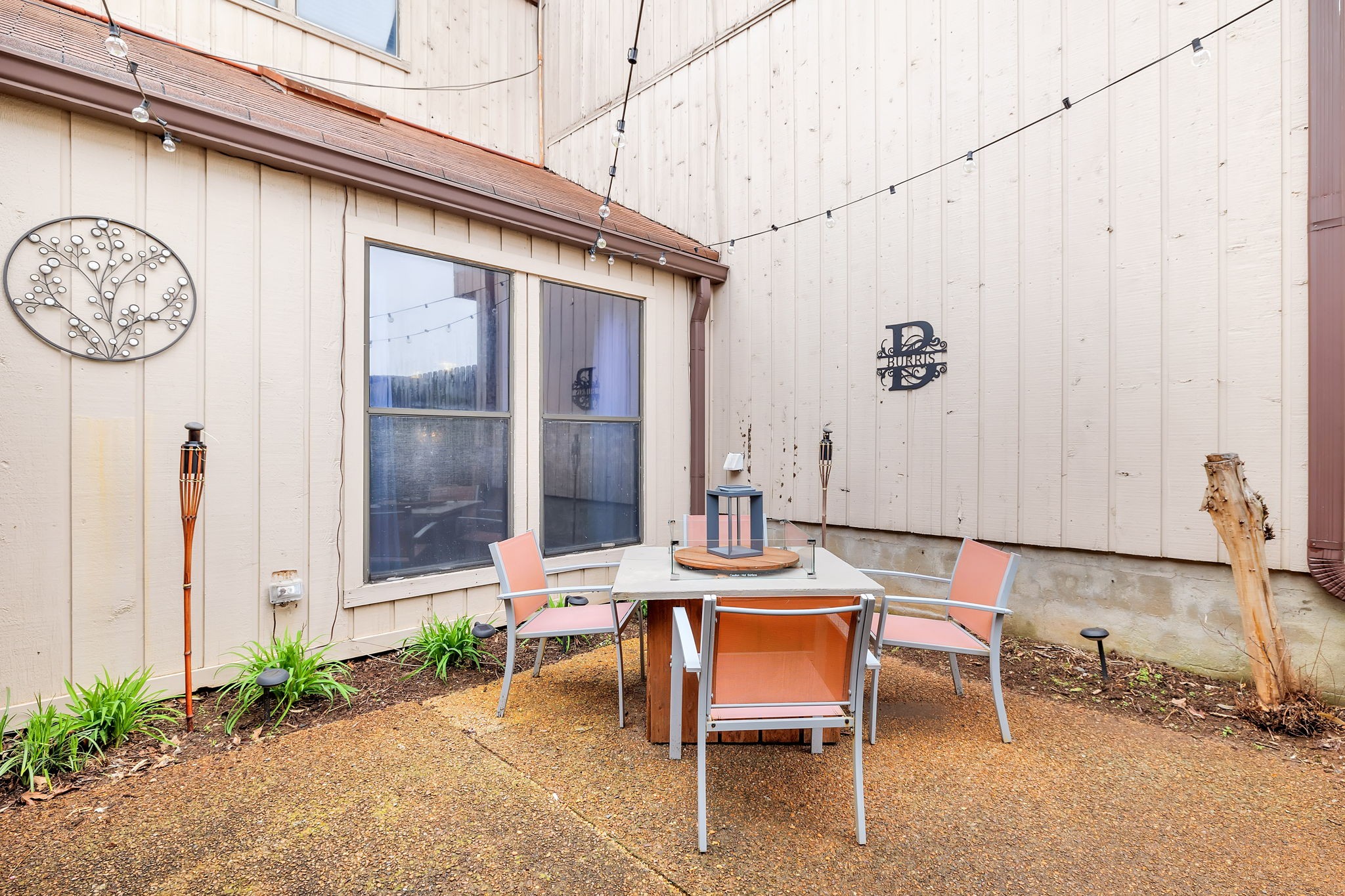 214 Harpers Mill Road Hermitage, TN 37076 - Photo 34 of 42 a backyard of a house with table and chairs