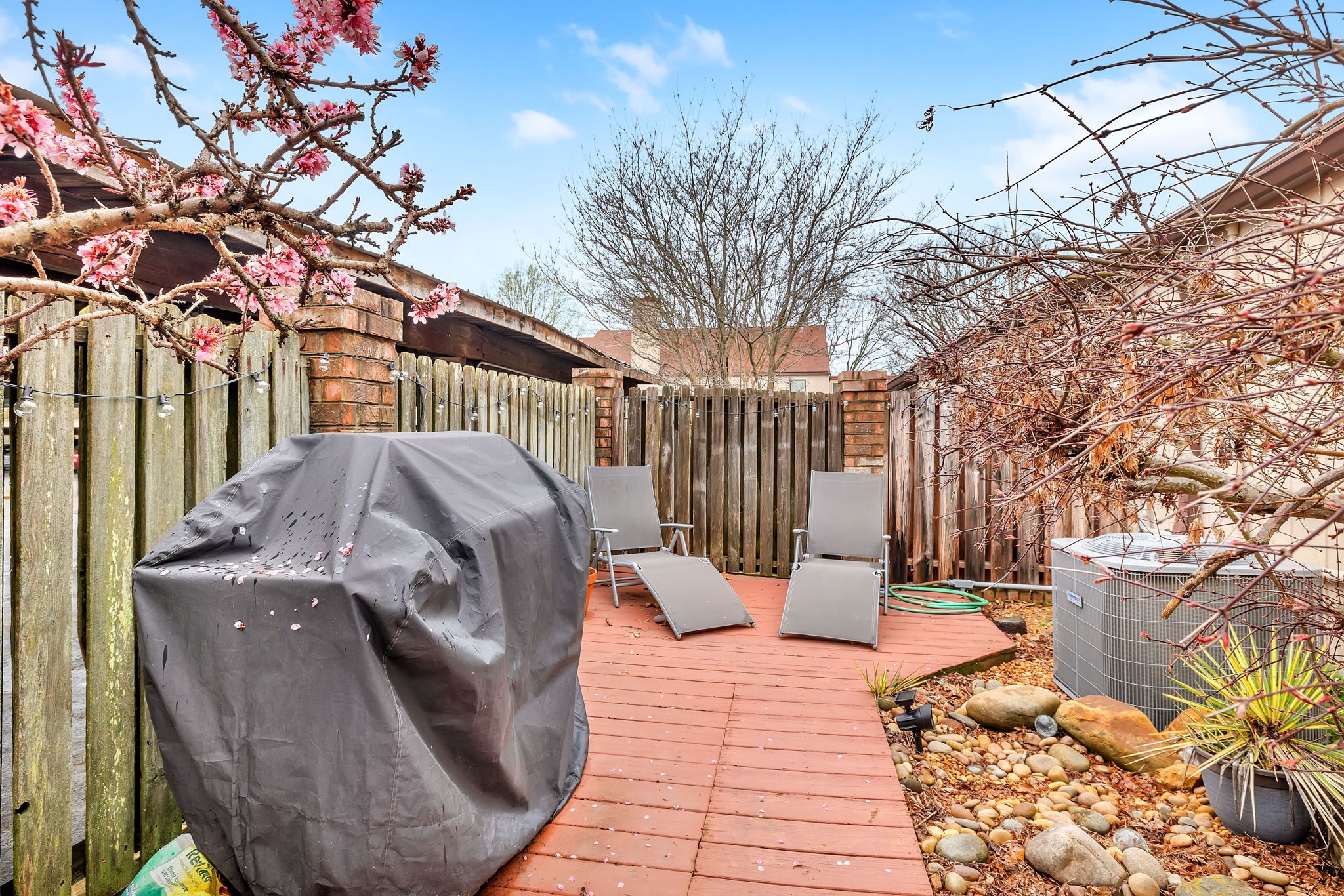 214 Harpers Mill Road Hermitage, TN 37076 - Photo 36 of 42 a view of a deck with couches and wooden fence