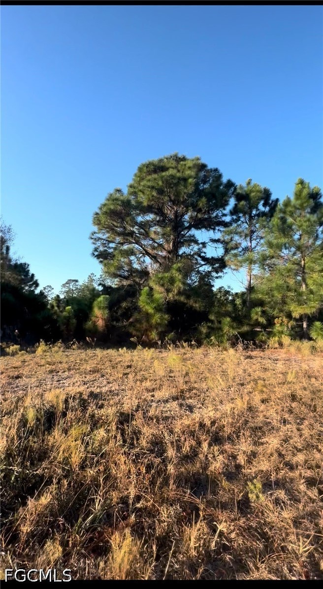 360 North Quebrada Street Clewiston, FL 33440 - Photo 5 of 9 a view of a lake with a lake