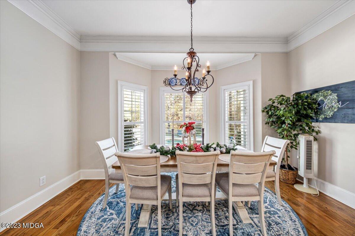 60 Walden Road Forsyth, GA 31029 - Photo 11 of 31 a view of a dining room with furniture and window