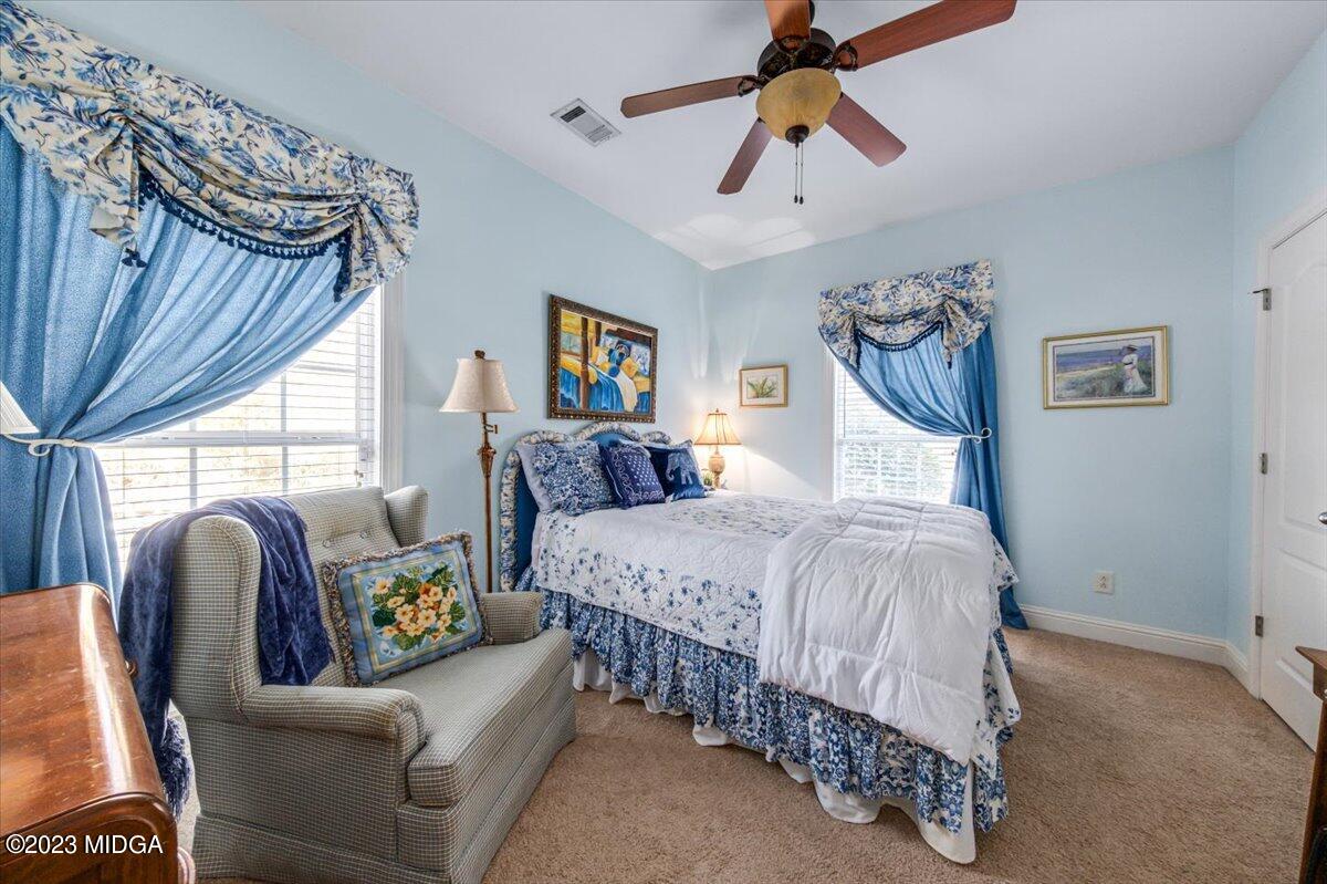 60 Walden Road Forsyth, GA 31029 - Photo 20 of 31 a bedroom with bed and window