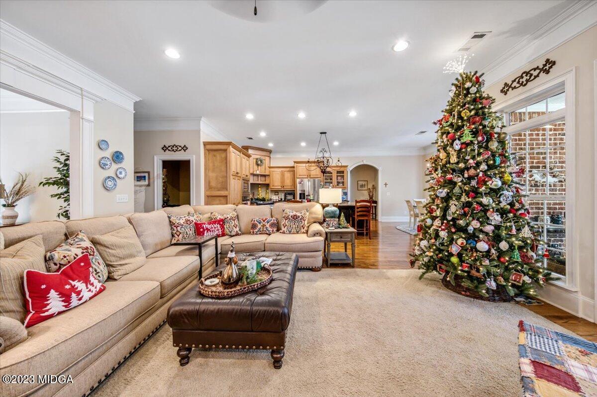 60 Walden Road Forsyth, GA 31029 - Photo 6 of 31 a living room with furniture and a christmas tree
