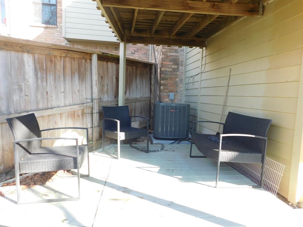 622 Crowley Road Arlington, TX 76012 - Photo 31 of 38 a patio with table and chairs