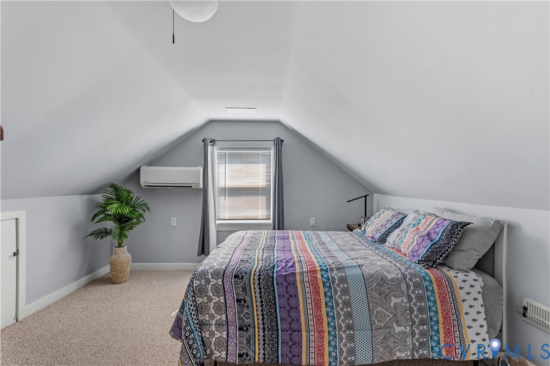 2107 Lennox Road Henrico, VA 23228 - Photo 31 of 47 Carpeted attic room featuring sloped ceilings, a w