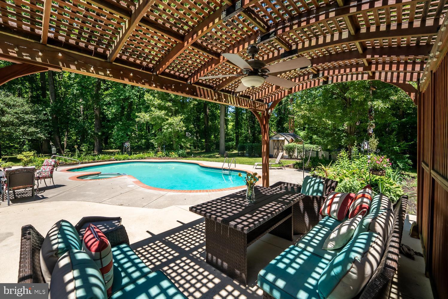 814 Wrights Neck Road Centreville, MD 21617 - Photo 19 of 53 a view of a backyard with sitting area