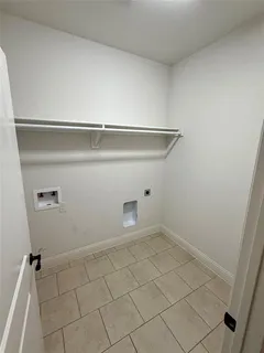 a view of a hallway with white door