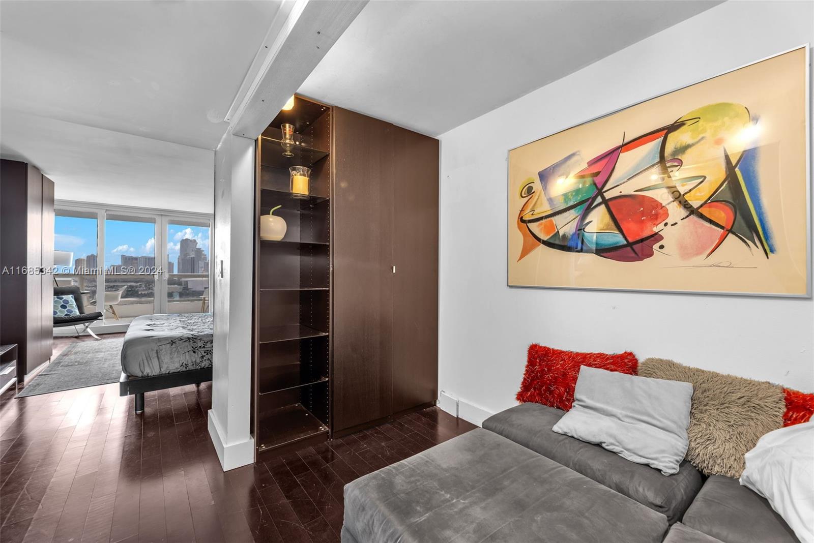 Omni Miami, FL 33132 - Photo 31 of 51 a living room with furniture and wooden floor