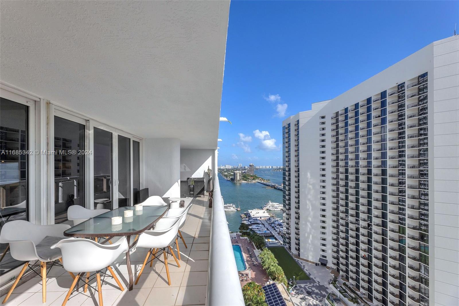 Omni Miami, FL 33132 - Photo 44 of 51 a balcony with table and chairs