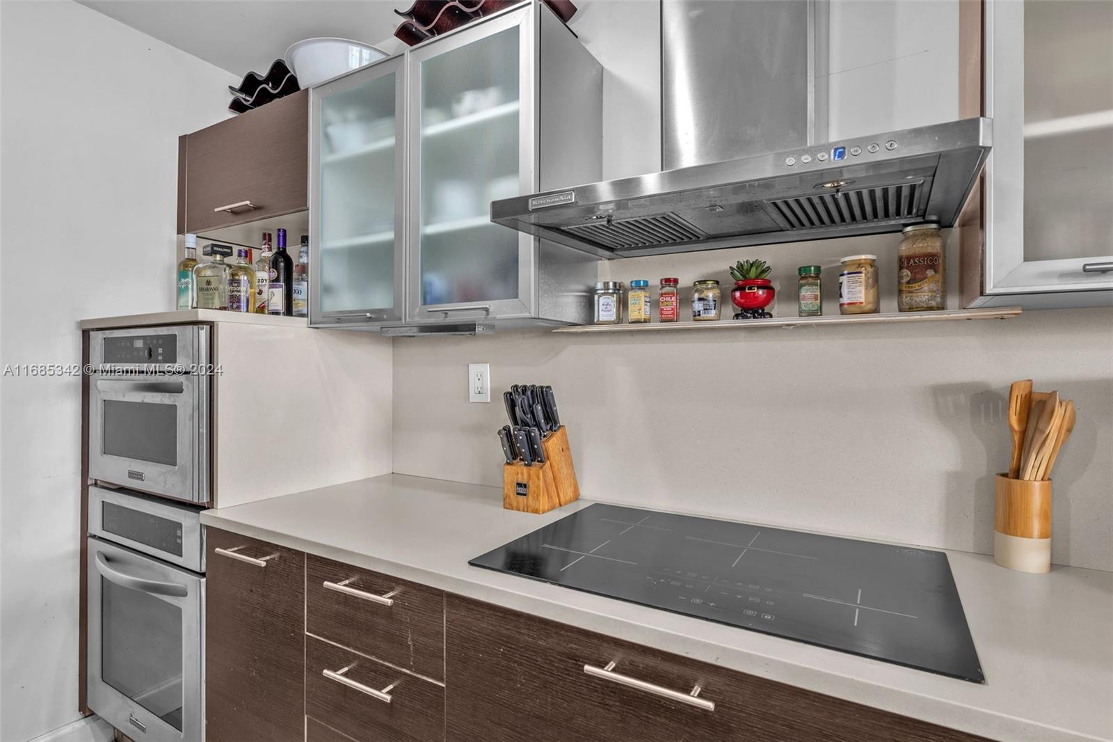 Omni Miami, FL 33132 - Photo 50 of 51 a kitchen with a refrigerator and an sink