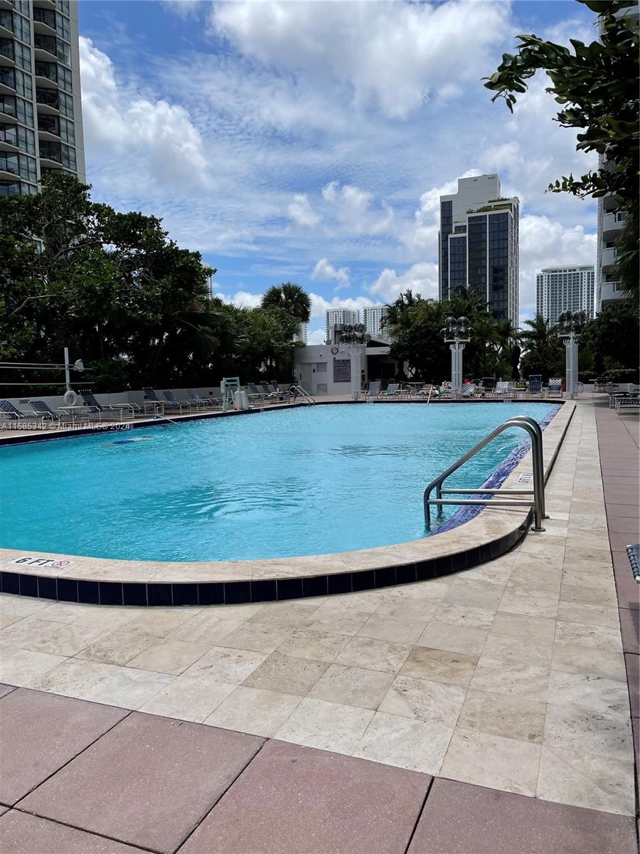 Omni Miami, FL 33132 - Photo 10 of 51 a view of a yard in front of the house