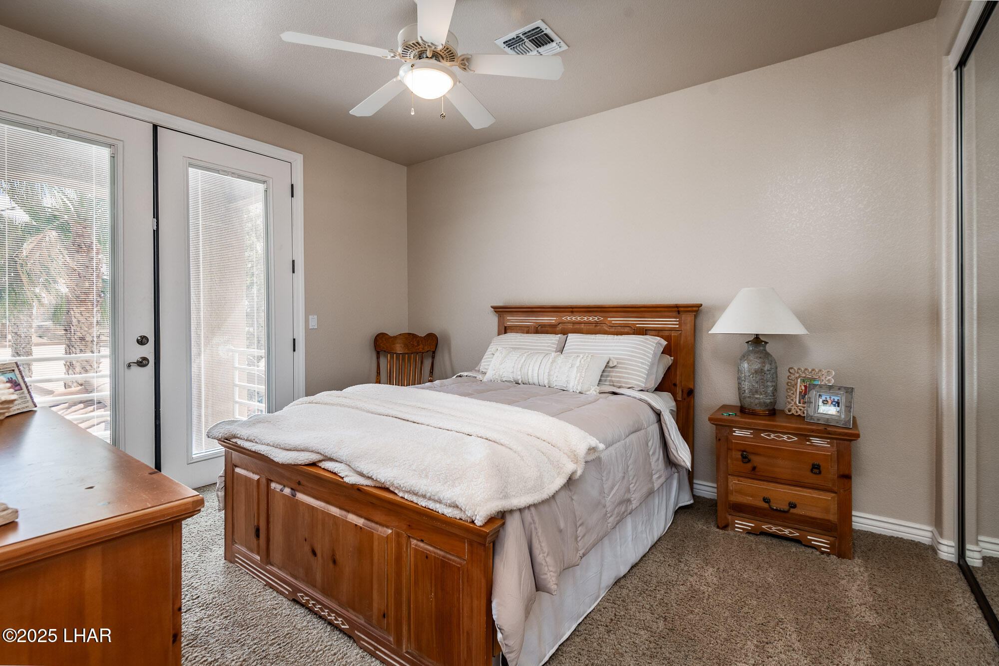 9967 Dike Road Mohave Valley, AZ 86440 - Photo 35 of 110 Upper Guest Bedroom w/ patio